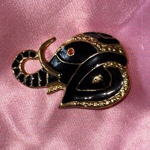 Elegant Black and Gold Elephant Brooch